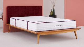 Best hybrid mattress: image shows the Awara Natural Hybrid Mattress in an orange bedroom