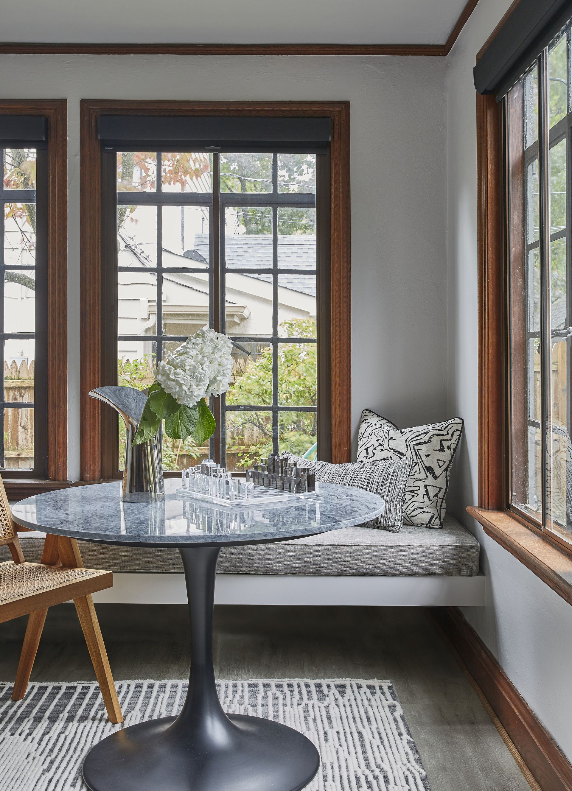 A living room corner table with fresh flowers
