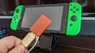 Nintendo Switch plugged into 8Bitdo adapter