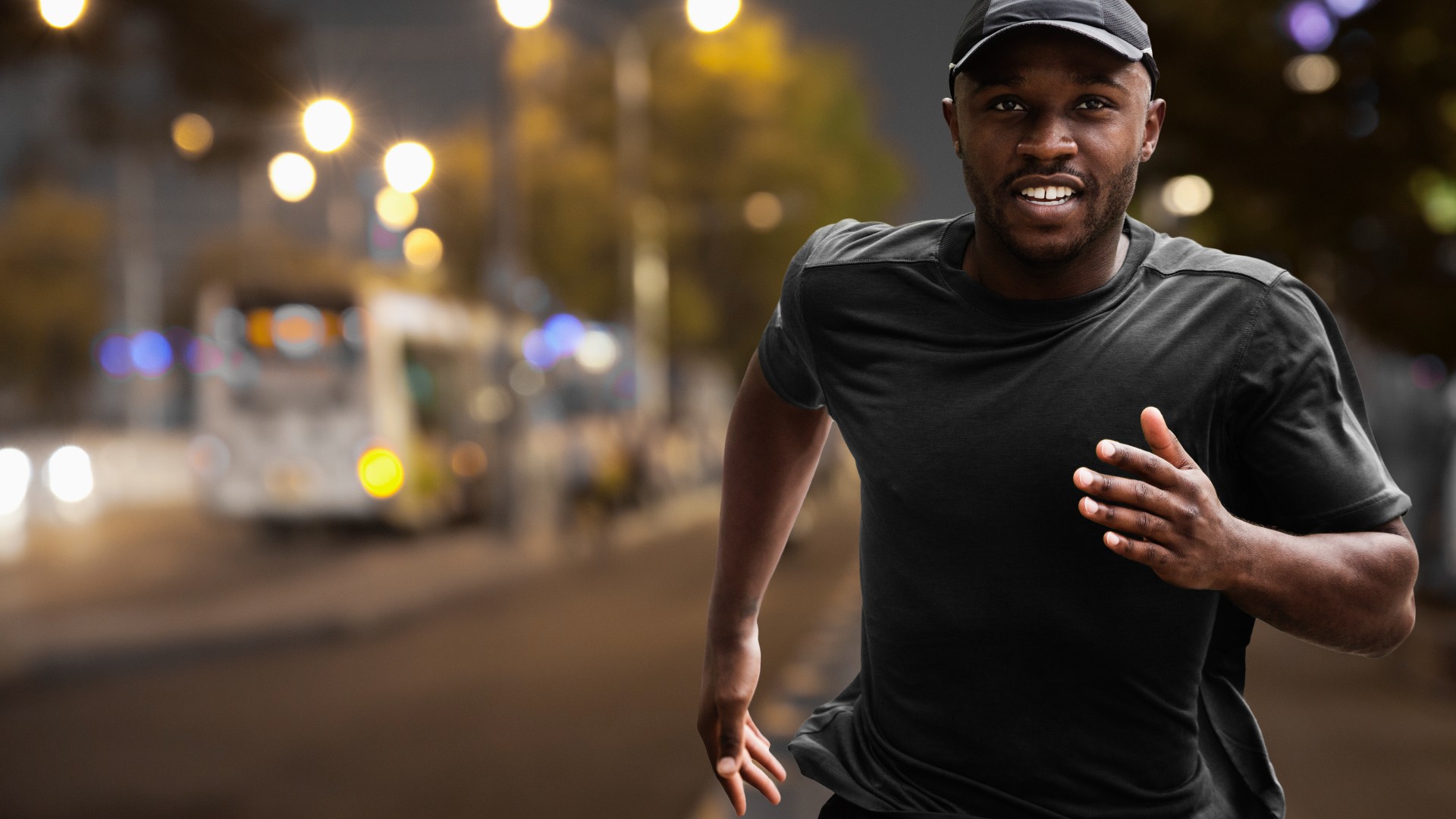 Man running in the city at night