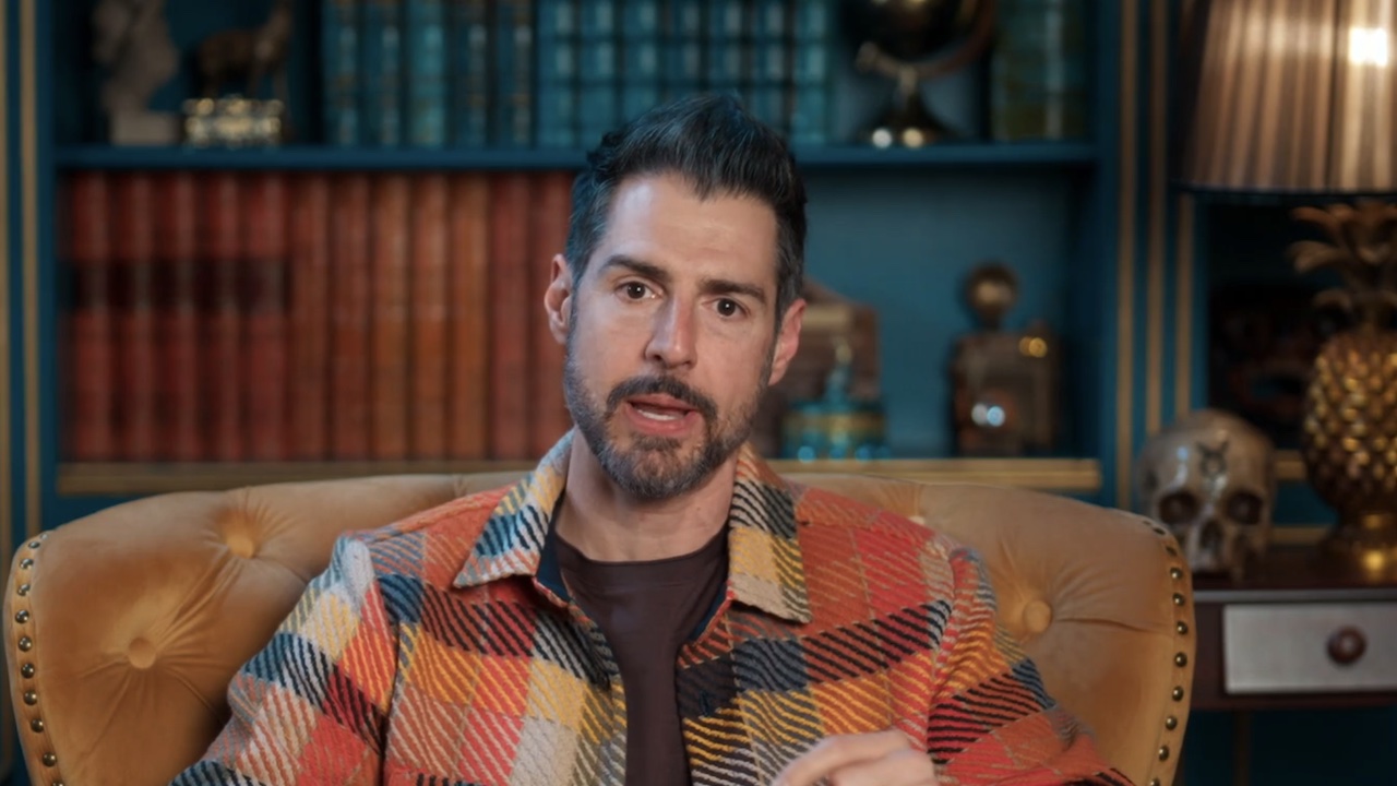 Rob talking about the conga line in a confessional on The Traitors 