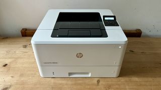 HP LaserJet Pro 4002dn on a white background