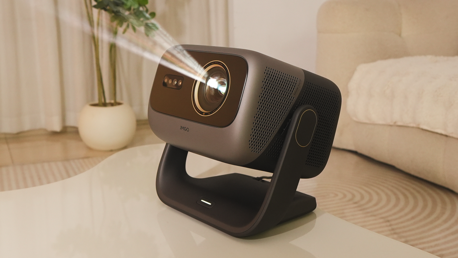 A 4K projector, the N3 Ultimate, projecting an image to the top left corner. 