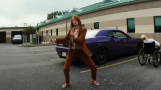 Emma Stone dancing in Kinds of Kindness.