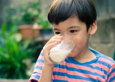 child drinking milk