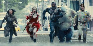 Ratcatcher-2, Harley Quinn, Bloodsport, King Shark, and Polka Dot Man run into action in The Suicide Squad.