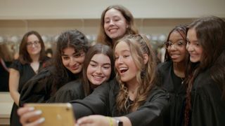 Brooke Taylor and additional Girls State participants take a selfie together.