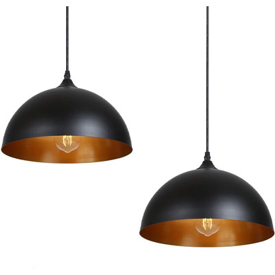 pair of black and brass pendant lights