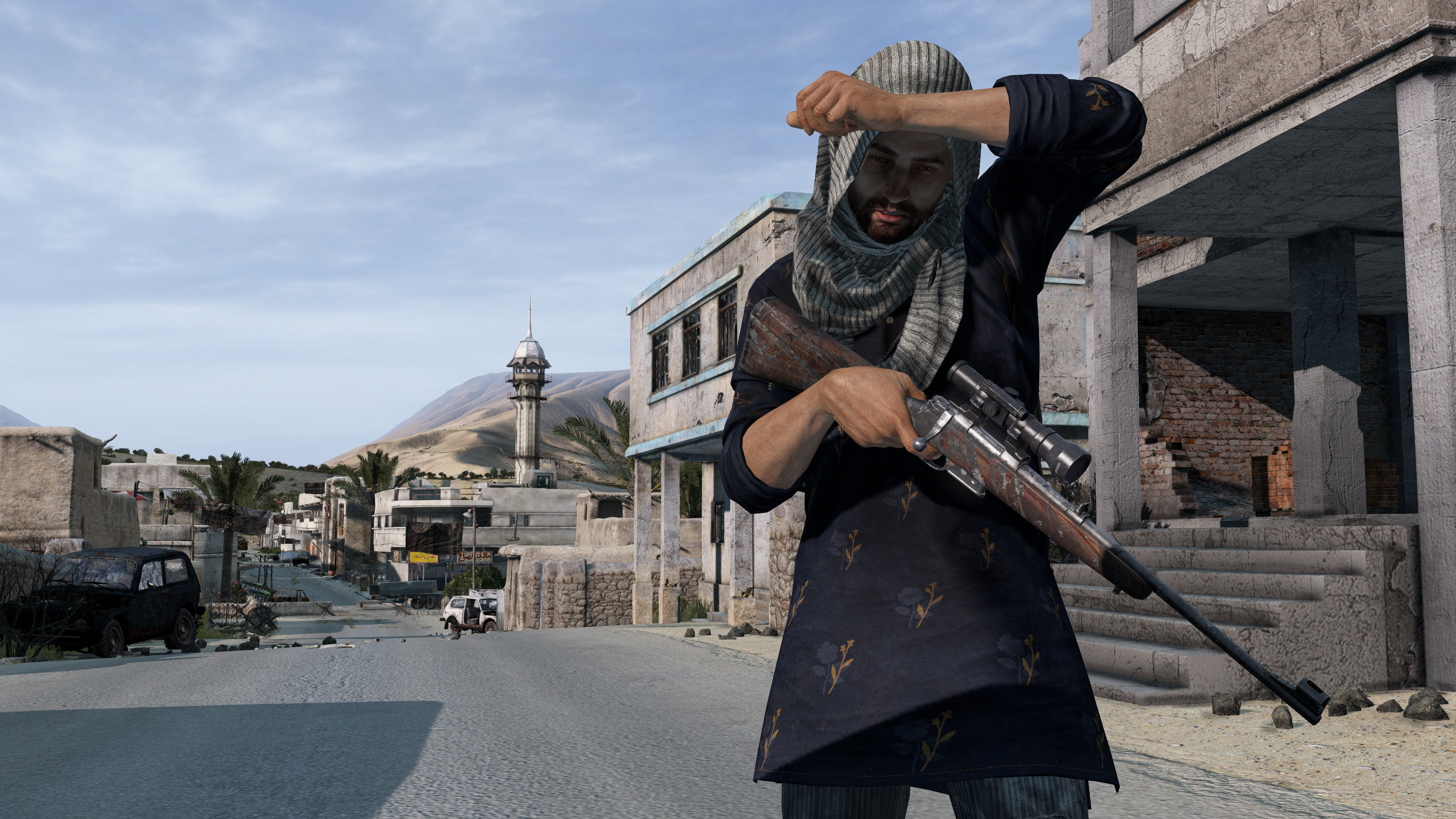 A person with a rifle wiping their brow