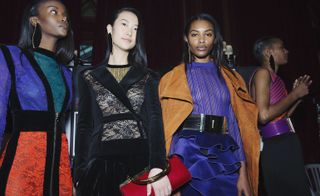Models wearing colorful clothing and transparent lace