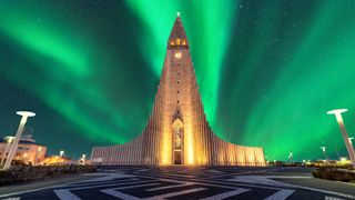aurora borealis above hallgrimskirkja church in central of reykjavik city capital city in Iceland