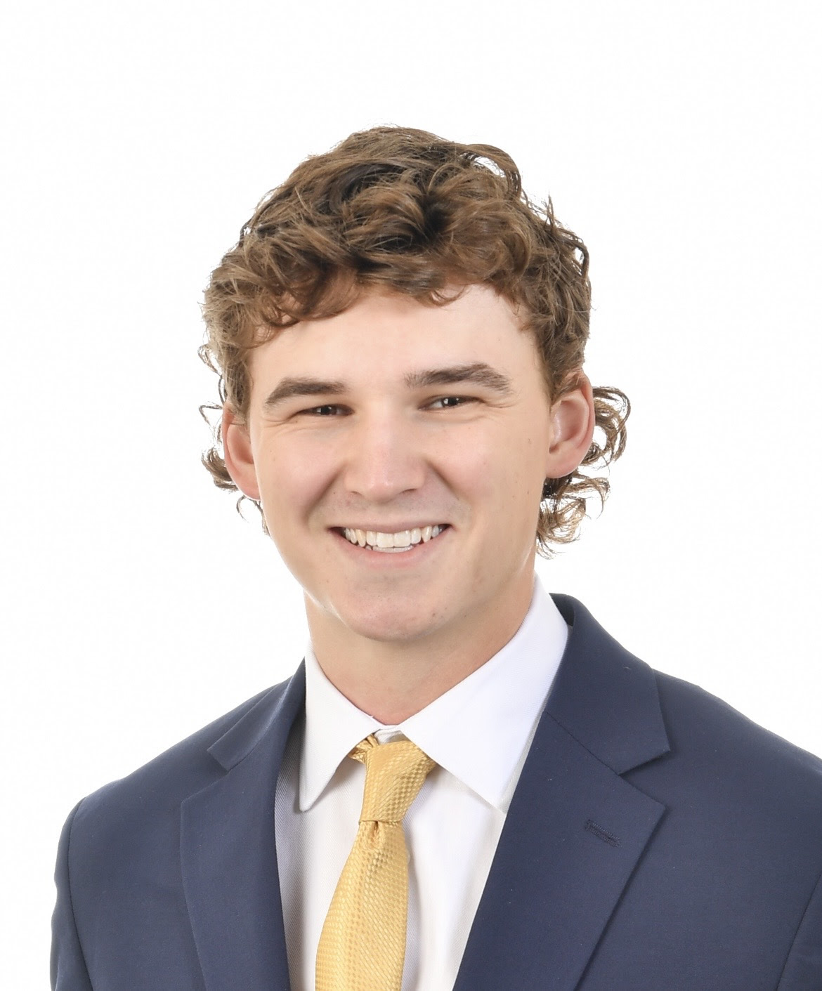 Smiling headshot of Thomas Welling.