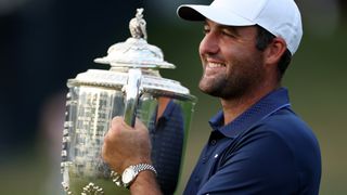 Scottie Scheffler poses with the Wanamaker Trophy after winning the 2025 PGA Championship