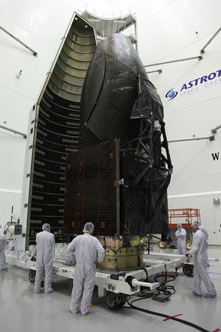 Technicians Move Half of TDRS-K Spacecraft Payload