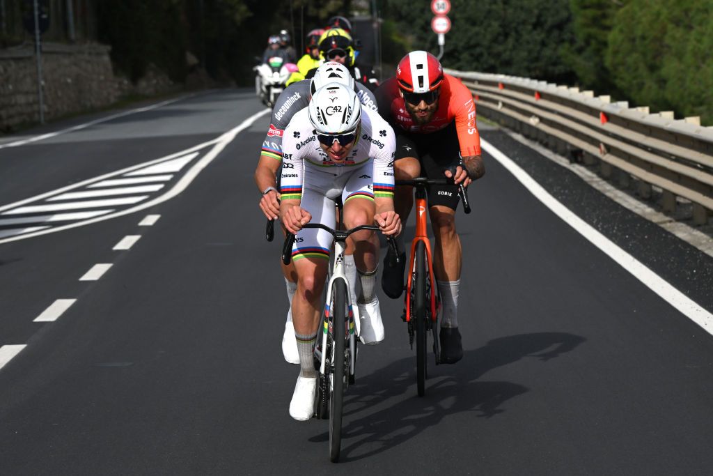 SANREMO ITALY MARCH 22 LR Tadej Pogacar of Slovenia and Team UAE Team Emirates and Filippo Ganna of Italy and Team INEOS Grenadiers compete in the breakaway during the 116th MilanoSanremo 2025 a 289km one day race from Pavia to Sanremo UCIWT on March 22 2025 in Sanremo Italy Photo by Dario BelingheriGetty Images