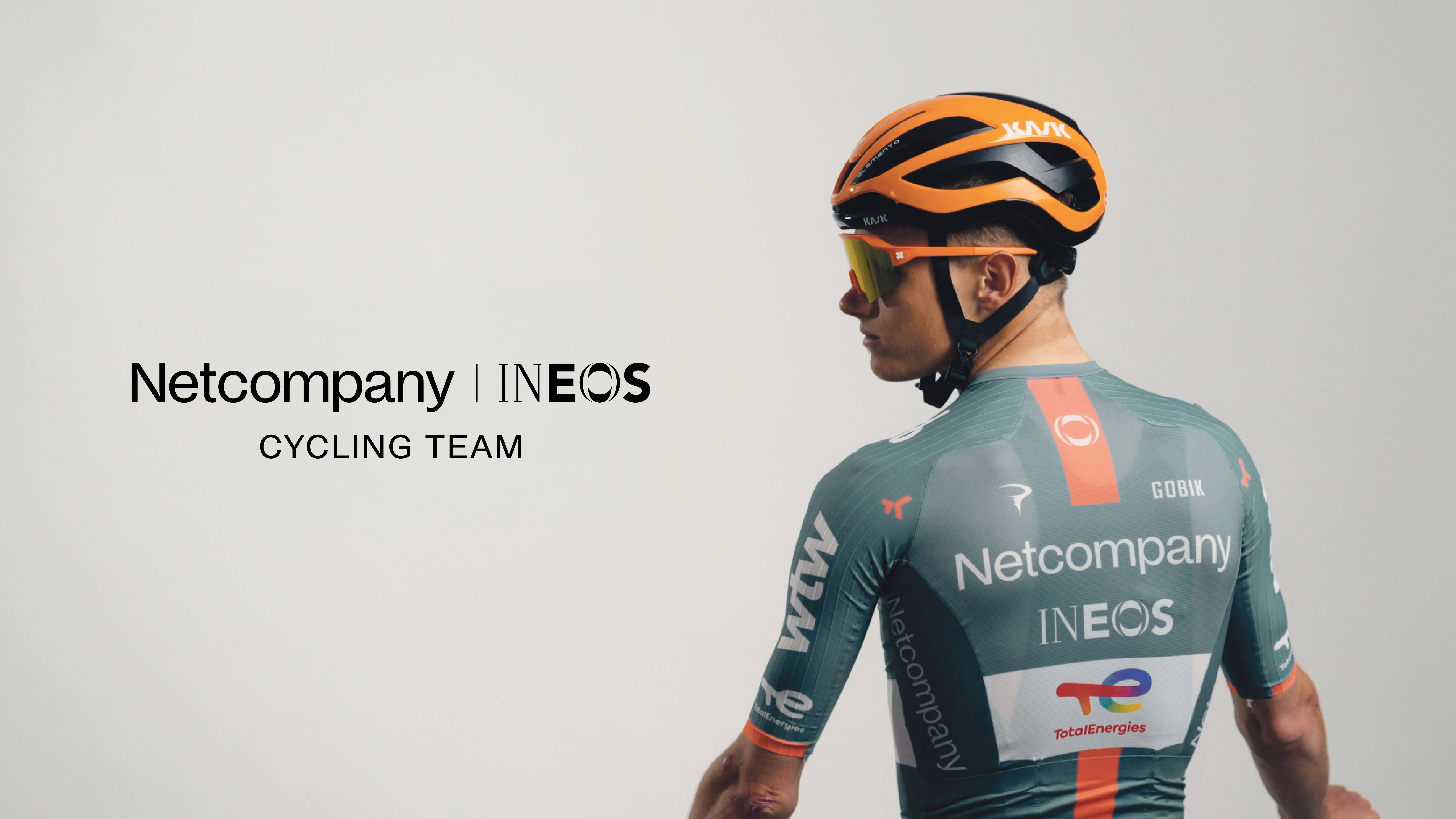 An image showing the new logo and the back of the new kit for the revamped Netcompany Ineos Cycling Team