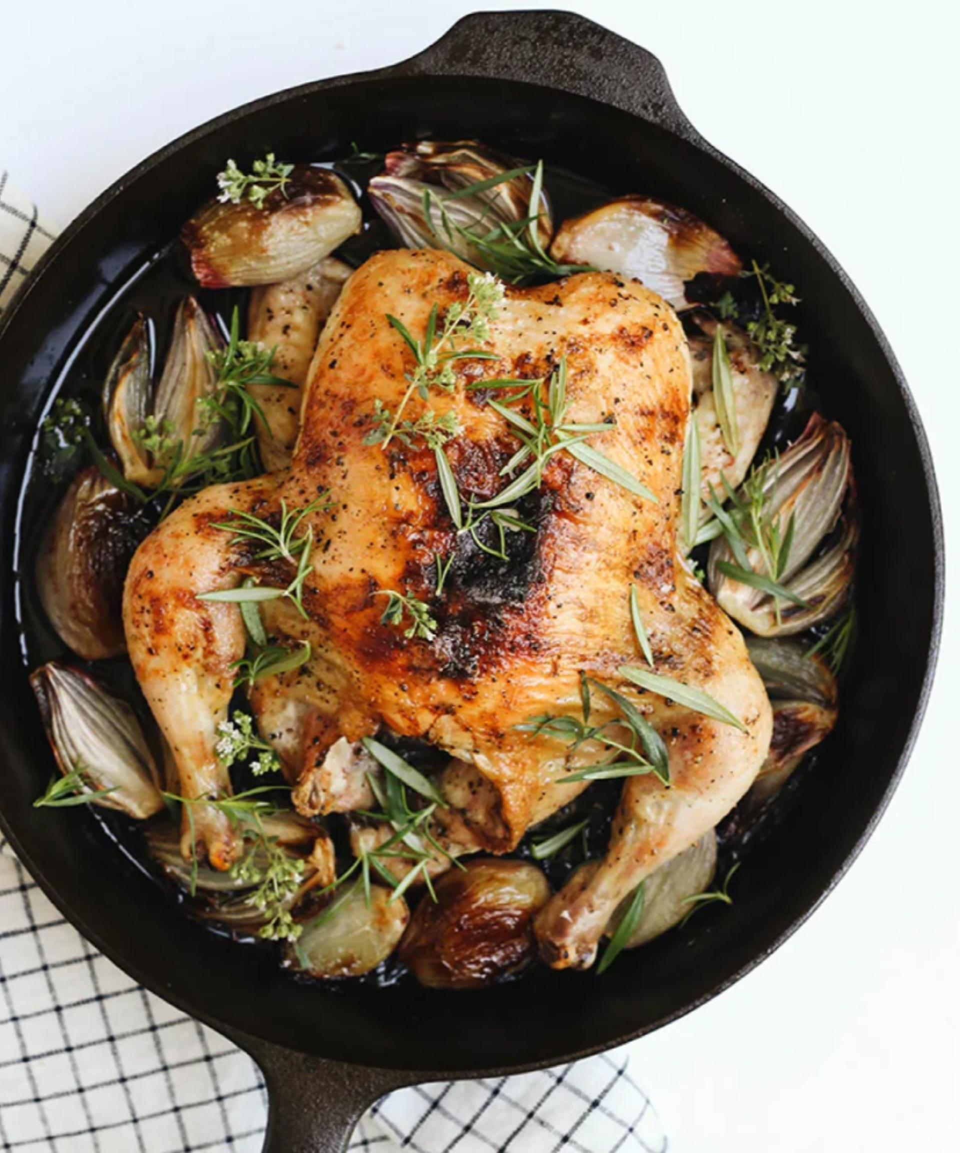 Field Company skillet with a roasted chicken and vegetables