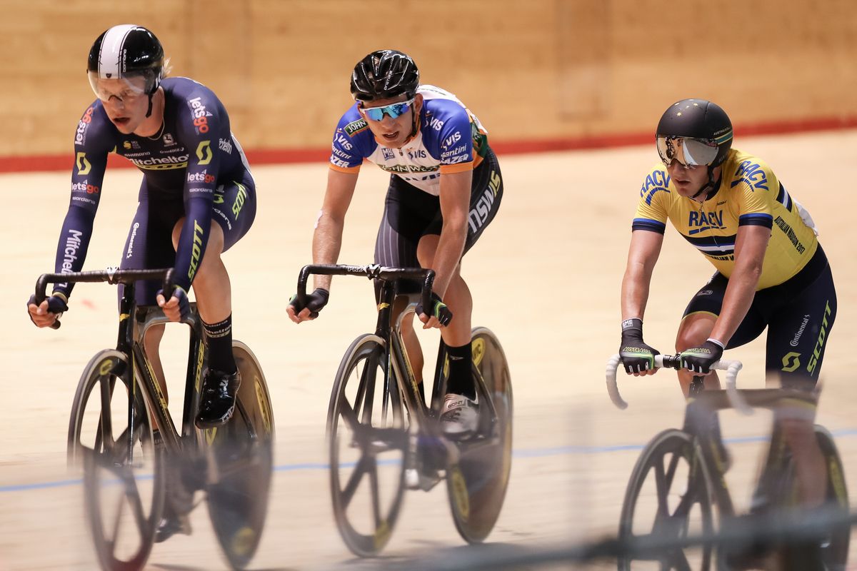 Cam Scott riding behind Alex Porter