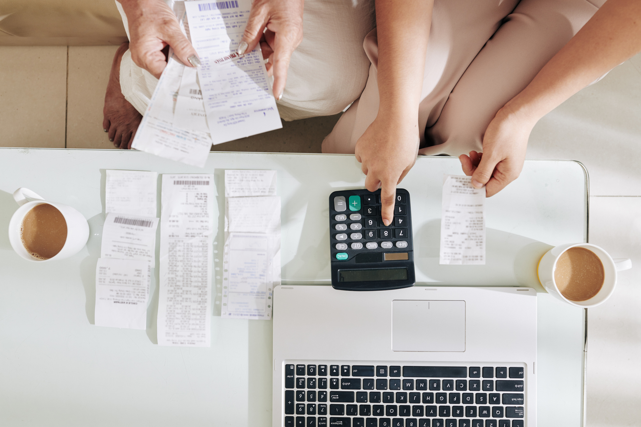 Two people gathering insurance documentation