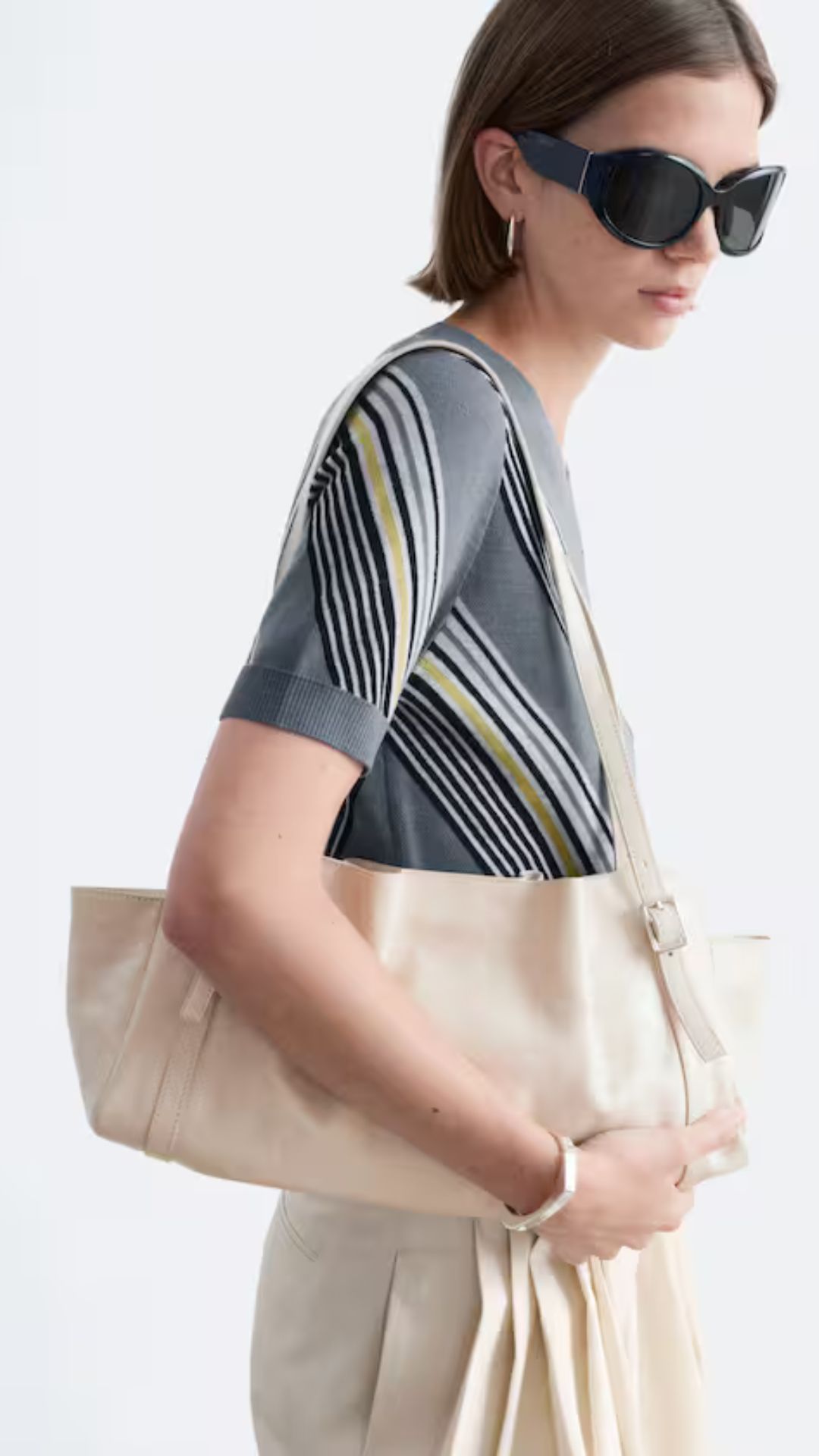 a model wearing &amp;amp; other stories clothing and bag