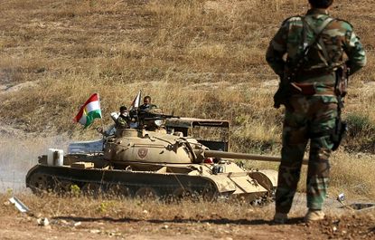 Kurdish Peshmerga fighters east of Mosul. 