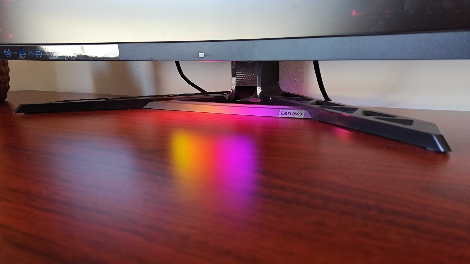 Lenovo Legion Y34wz30 stand with RGB lights shining on desk