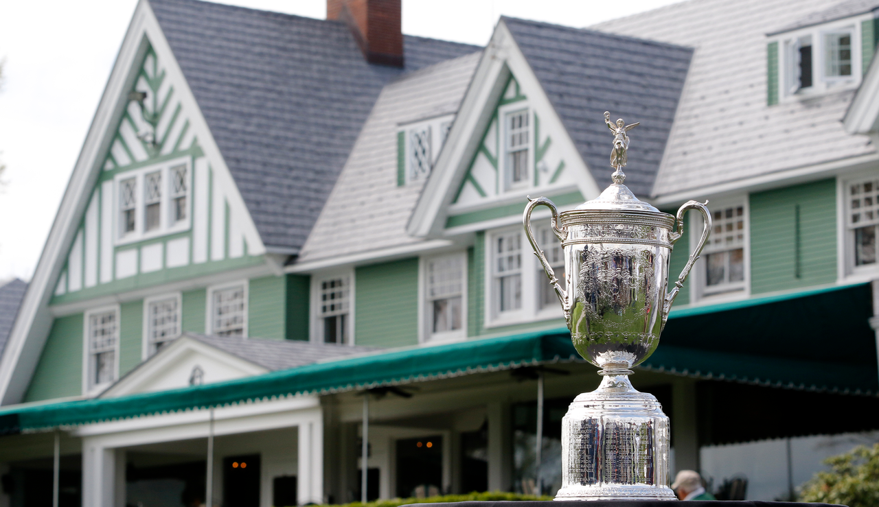 The US Open trophy in front of Oakmont&#039;s clubhouse