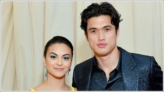 Charles Melton and Camila Mendes posing together as they attend The 2019 Met Gala Celebrating Camp: Notes on Fashion at Metropolitan Museum of Art on May 06, 2019 in New York City. (