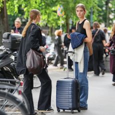 Models are seen outside of the show, outside Jil Sander, during Milan Fashion Week - Womenswear Spring/Summer 2026, on September 24, 2025 in Milan, Italy (Photo by Edward Berthelot/Getty Images)