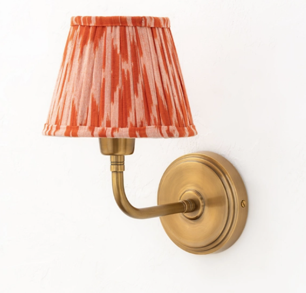 Wall light with pink shade
