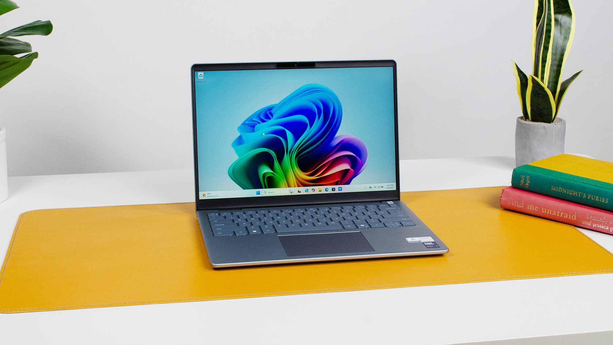 A Dell 14 Plus on a desk