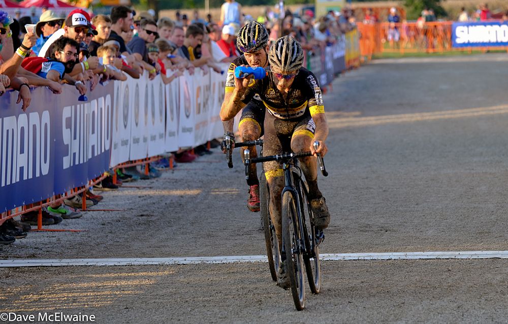 Quinten Hermans (BEL) sprays himself with water due to the hot and humid conditions