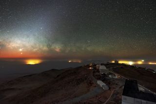 The two brightest planets in the night sky, Venus and Jupiter, meet up for a conjunction in front of the Milky Way's shimmering core in this view from the La Silla Observatory in Chile.