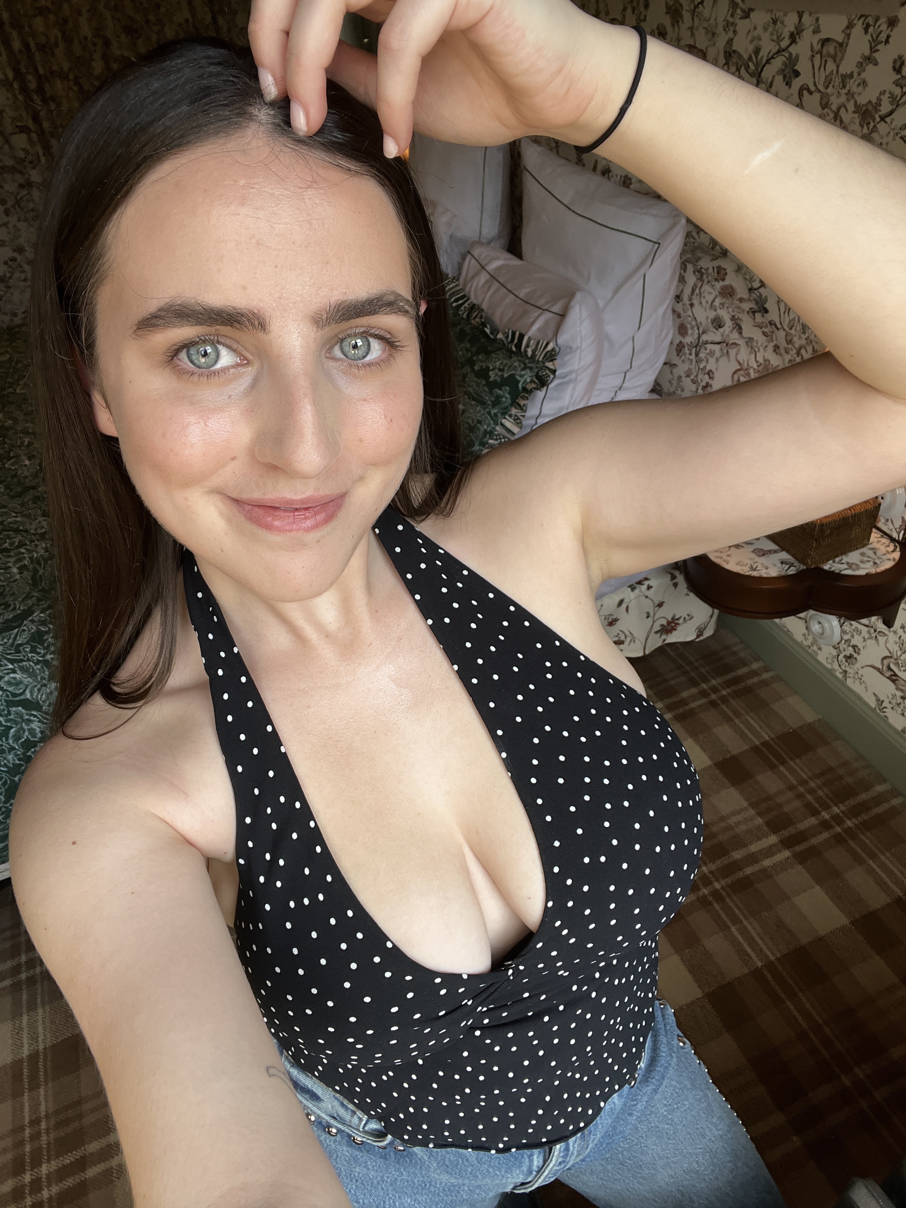 @avahgilchrist's image wearing a polka dot top, one of the key trends in summer 2025.