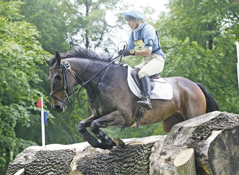 Izzy Taylor riding one-eyed Briarlands Blackberry over cross-country fence