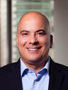 Smiling headshot of Shure's new VP of Global Sales.
