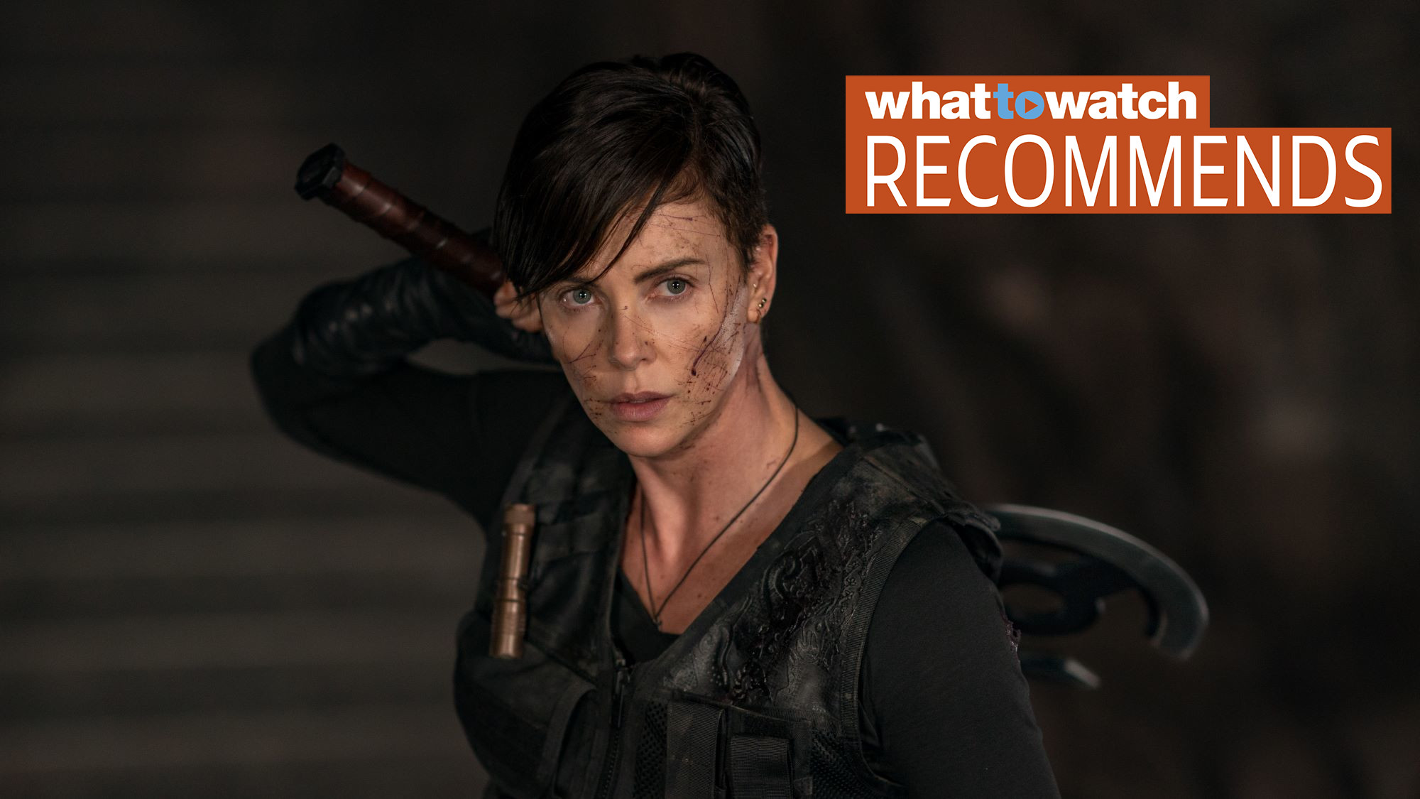 Charlize Theron in The Old Guard with a What to Watch Recommends graphic in top right corner