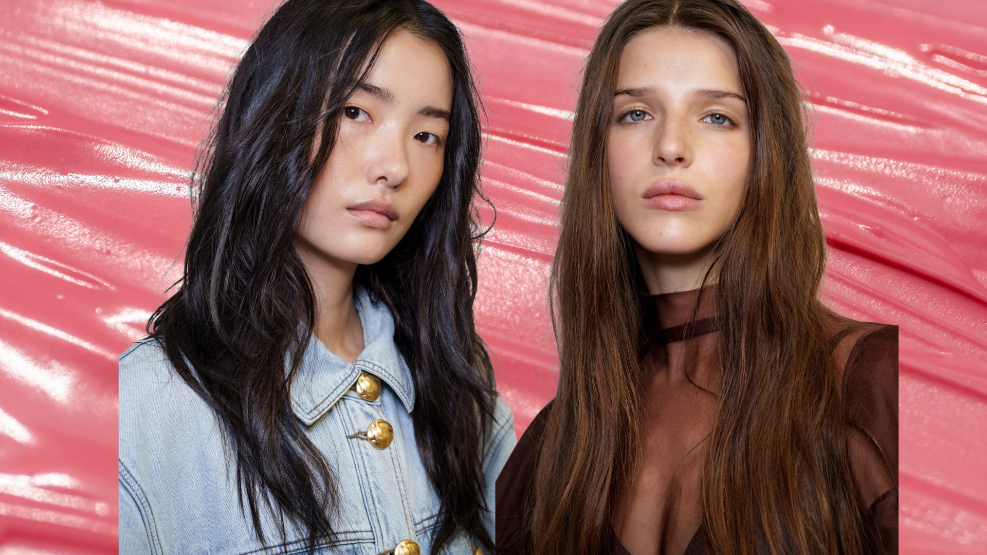 Two models with luminous, highlighted skin, staring at the camera. There is a pink background behind them. 