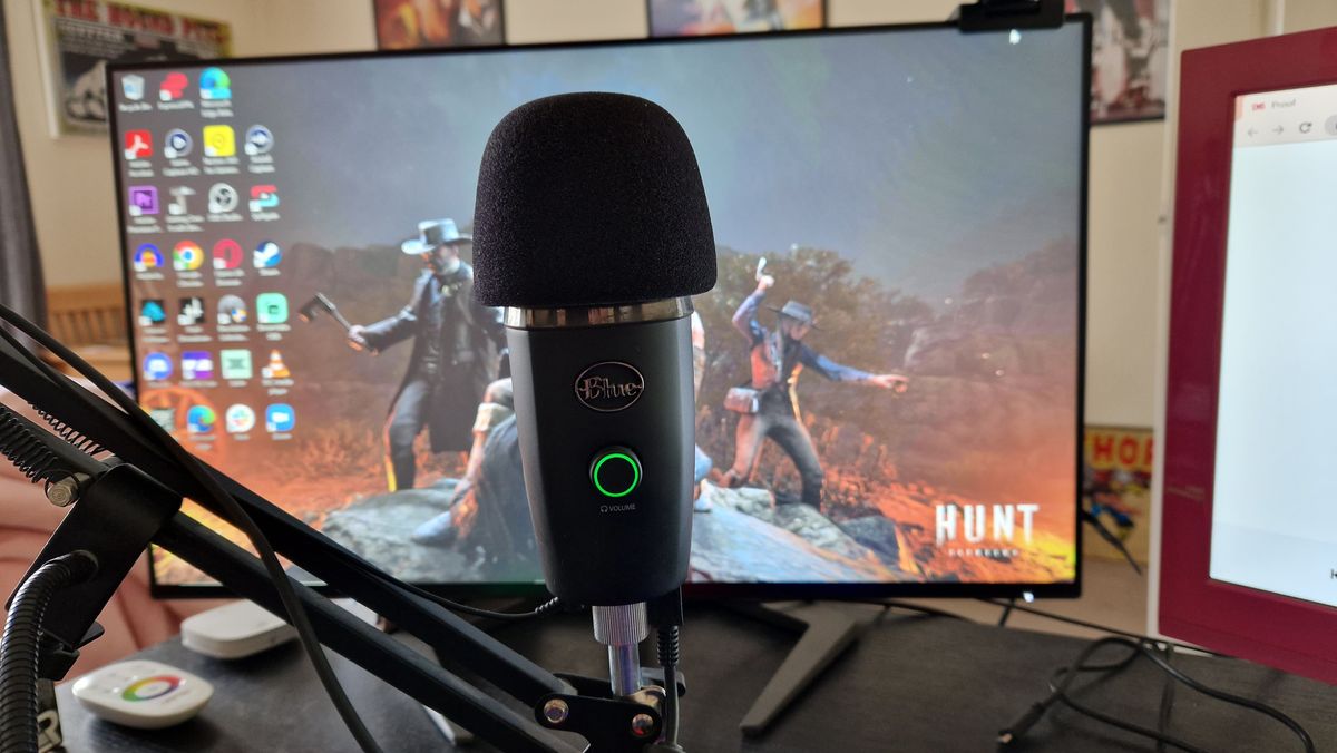 Blue Yeti Nano in front of a gaming monitor with cover on