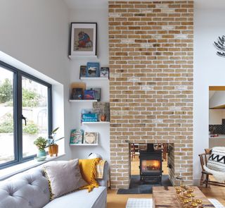 brick double sided fireplace in living room