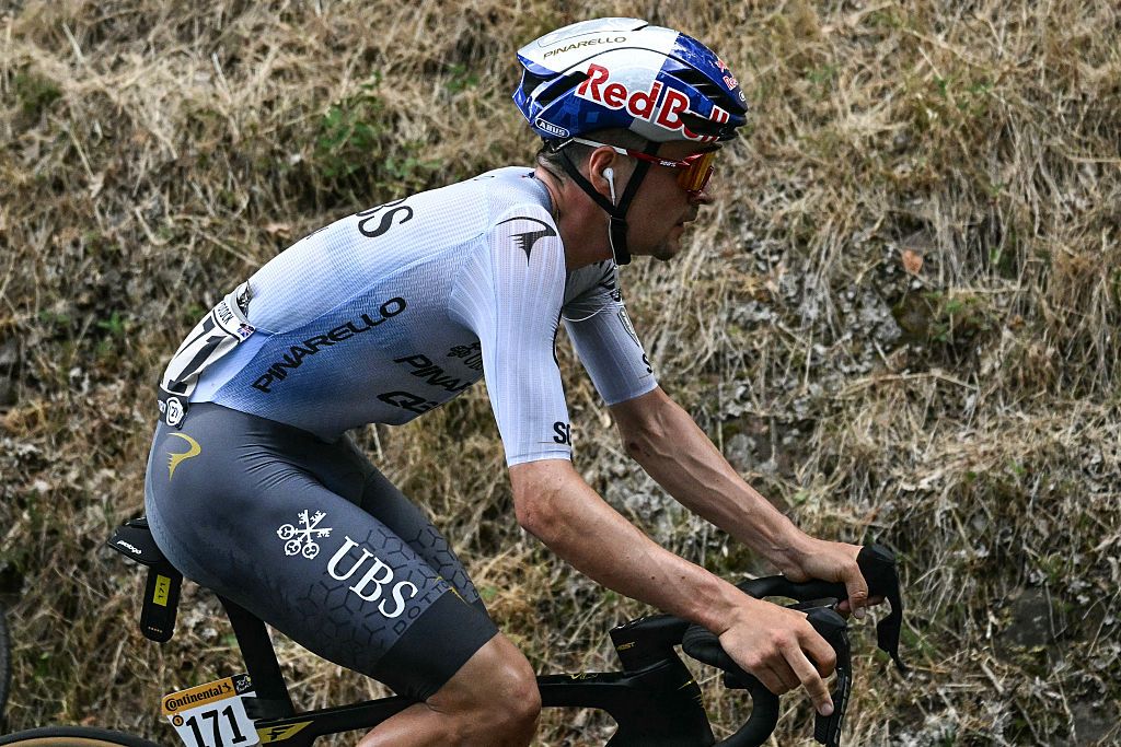 Pinarello Q36.5 Pro Cycling Team's British rider Tom Pidcock cycles during the 14th stage of the 113th edition of the Tour de France cycling race, 155,3 km between Mulhouse and Le Markstein in the Vosges mountains, on July 18, 2026. (Photo by Loic VENANCE / AFP)