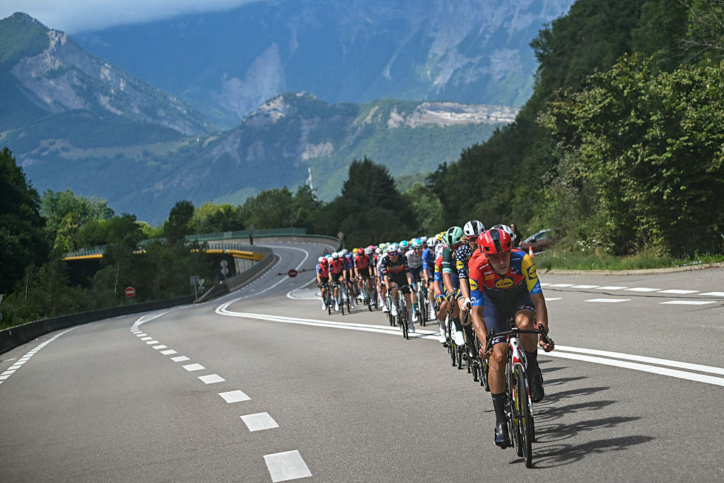 Lidl - Trek team's Belgian rider Jasper Stuyven leads the pack of riders (peloton) during the 18th stage of the 112th edition of the Tour de France cycling race, 171.5 km between Vif and Courchevel Col de la Loze, in the Alps, southeastern France, on July 24, 2025. (Photo by Loic VENANCE / AFP) (Photo by LOIC VENANCE/AFP via Getty Images)
