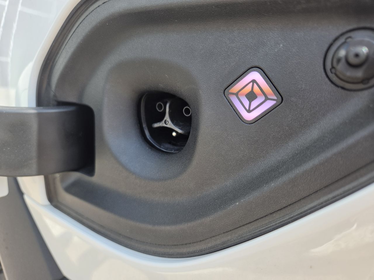 Photos of a car, plant, and man taken on the Samsung Galaxy S26