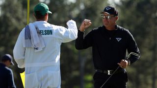 Phil Mickelson and his caddie at the 2023 Masters