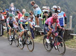 Team Education First rider Colombias Daniel Martinez R rides ahead of Team Bora rider Germanys Lennard Kamna C and Team Bora rider Germanys Maximilian Schachmann during the 13th stage of the 107th edition of the Tour de France cycling race 191 km between ChatelGuyon and Puy Mary on September 11 2020 Photo by KENZO TRIBOUILLARD AFP Photo by KENZO TRIBOUILLARDAFP via Getty Images