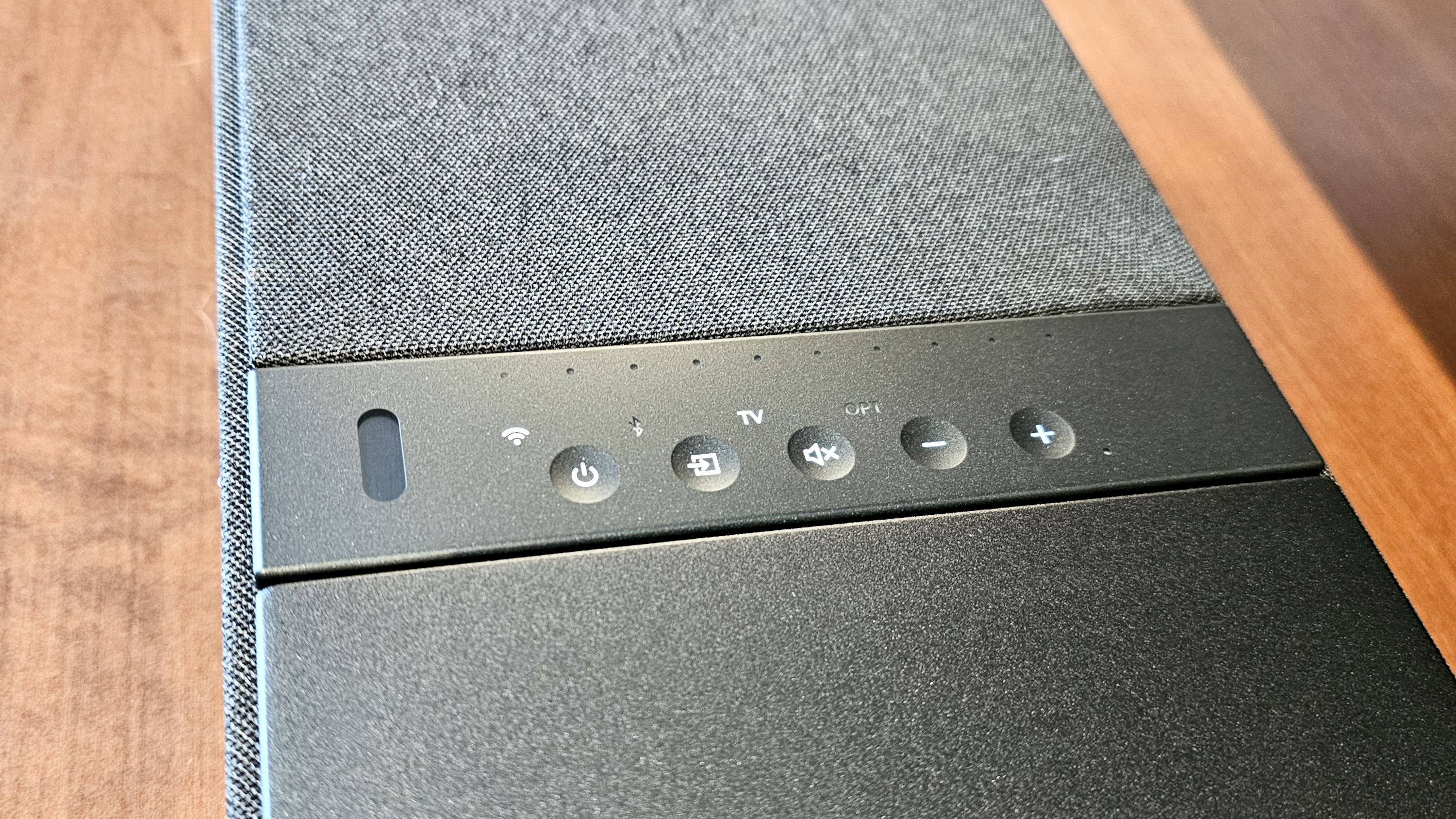 KEF XIO top surface control buttons