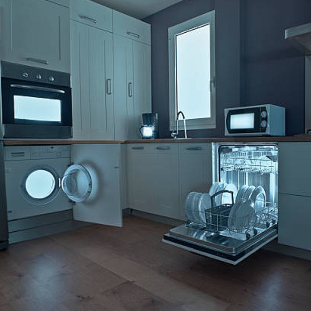 Oven, dishwasher, and washing machine open with lights glowing from inside