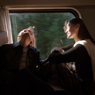 two women sitting on a train as part of the Bottega Veneta Lunar new year video