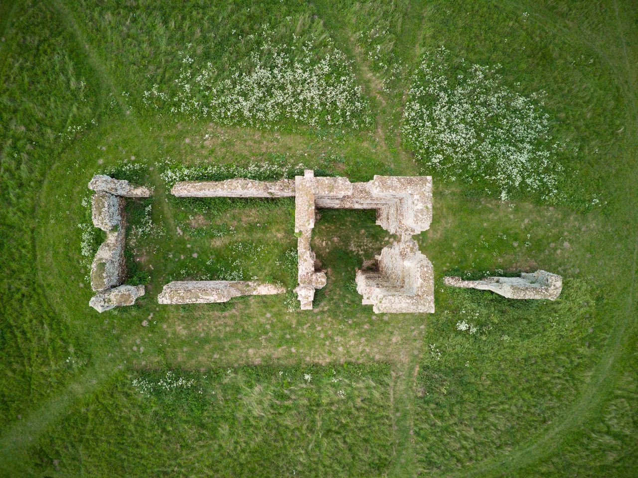 An aerial view of some old building foundations