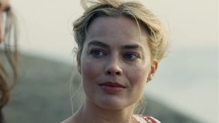 Close up of Margot Robbie with messy hair in Wuthering Heights.